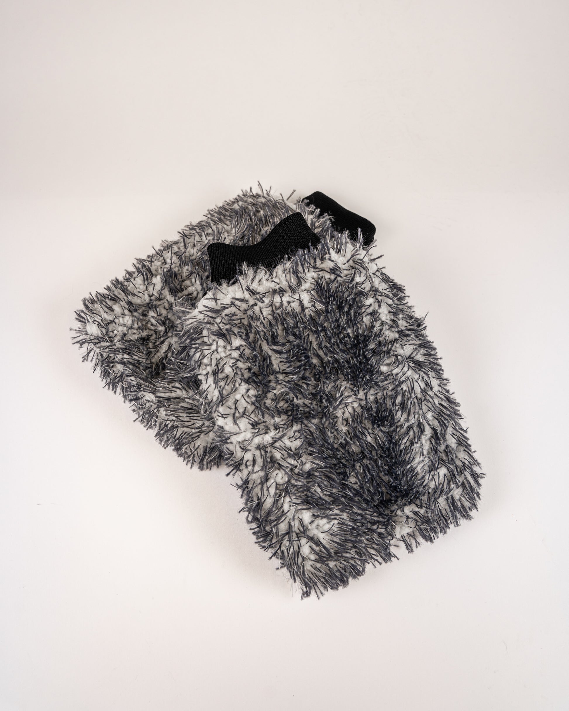 The FibreKing Gold Label Korean Microfibre Wash Mitt in grey features premium microfibre with dirt-trapping technology, black elastic wristbands, and a shaggy texture, shown on a plain white background.