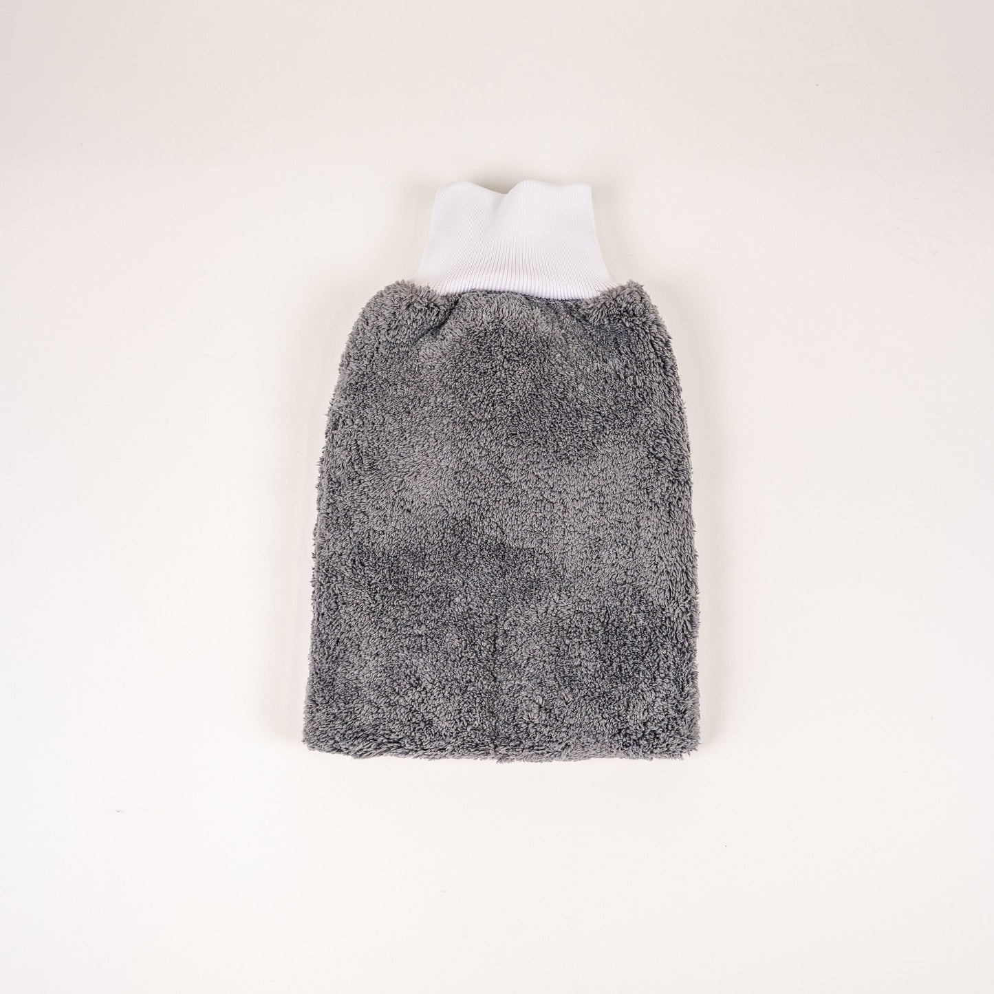 The FibreKing PS Korean Microfibre Mitt in grey, featuring an ultra-soft texture and white ribbed opening, is shown lying flat on a plain white background.