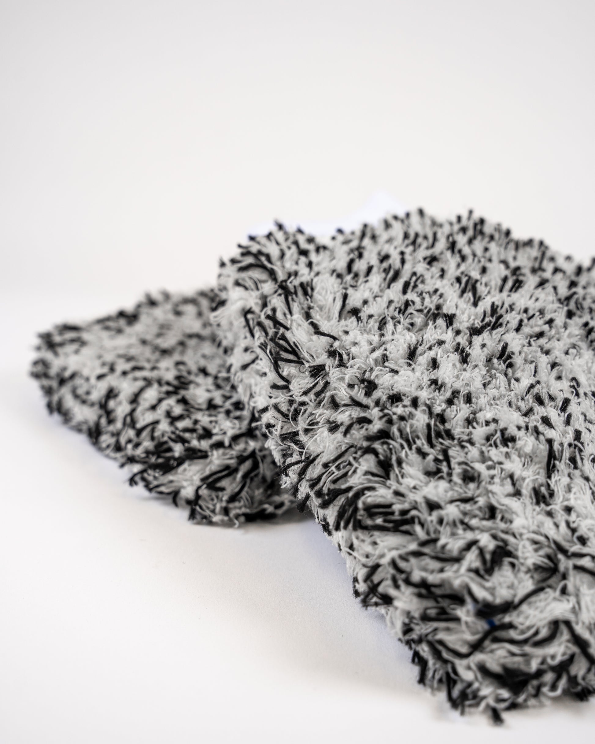 Close-up of the FibreKing Silver Label Korean Microfibre Wash Mitt in black, featuring premium Korean microfibre for gentle cleaning, shown on a white background.