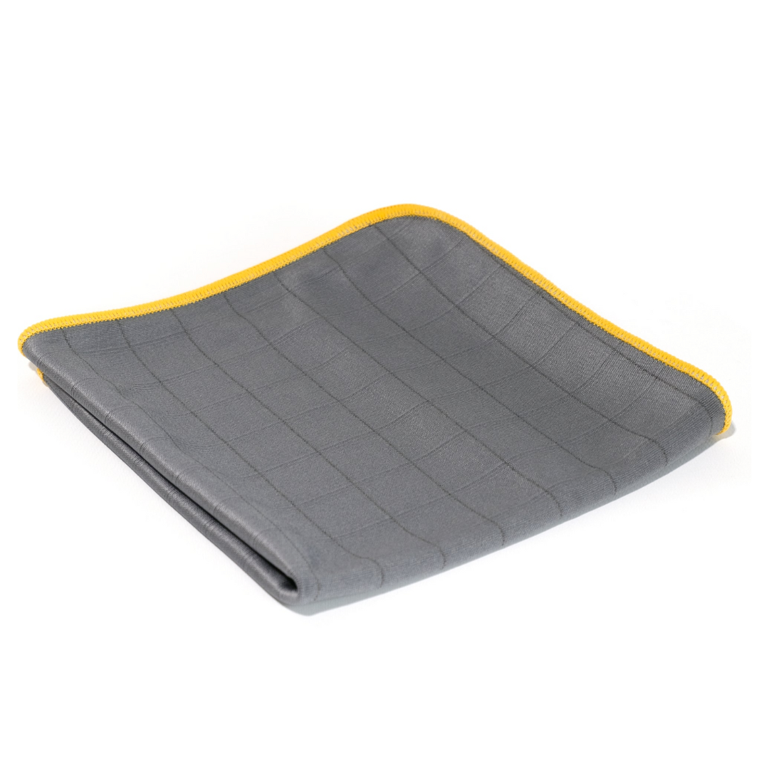 The FibreKing Carbon Glass Cloths - 3 Pack features folded gray anti-static microfiber cloths with a subtle grid pattern and yellow trim, shown on a white background.