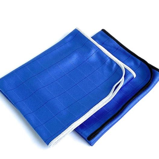 Three blue rectangular FibreKing Carbon Glass Cloths with black and white trim, neatly folded and stacked on a white background.