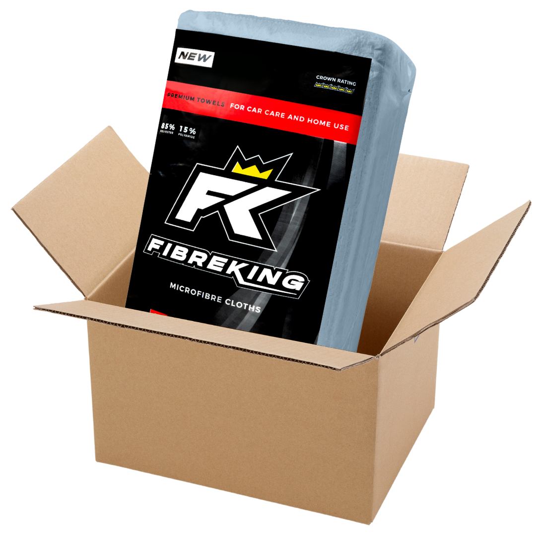 A box containing 10 packs of 36 Silver Label 325GSM microfibre cloths by FibreKing is shown in an open cardboard box, ideal for cleaning cars.