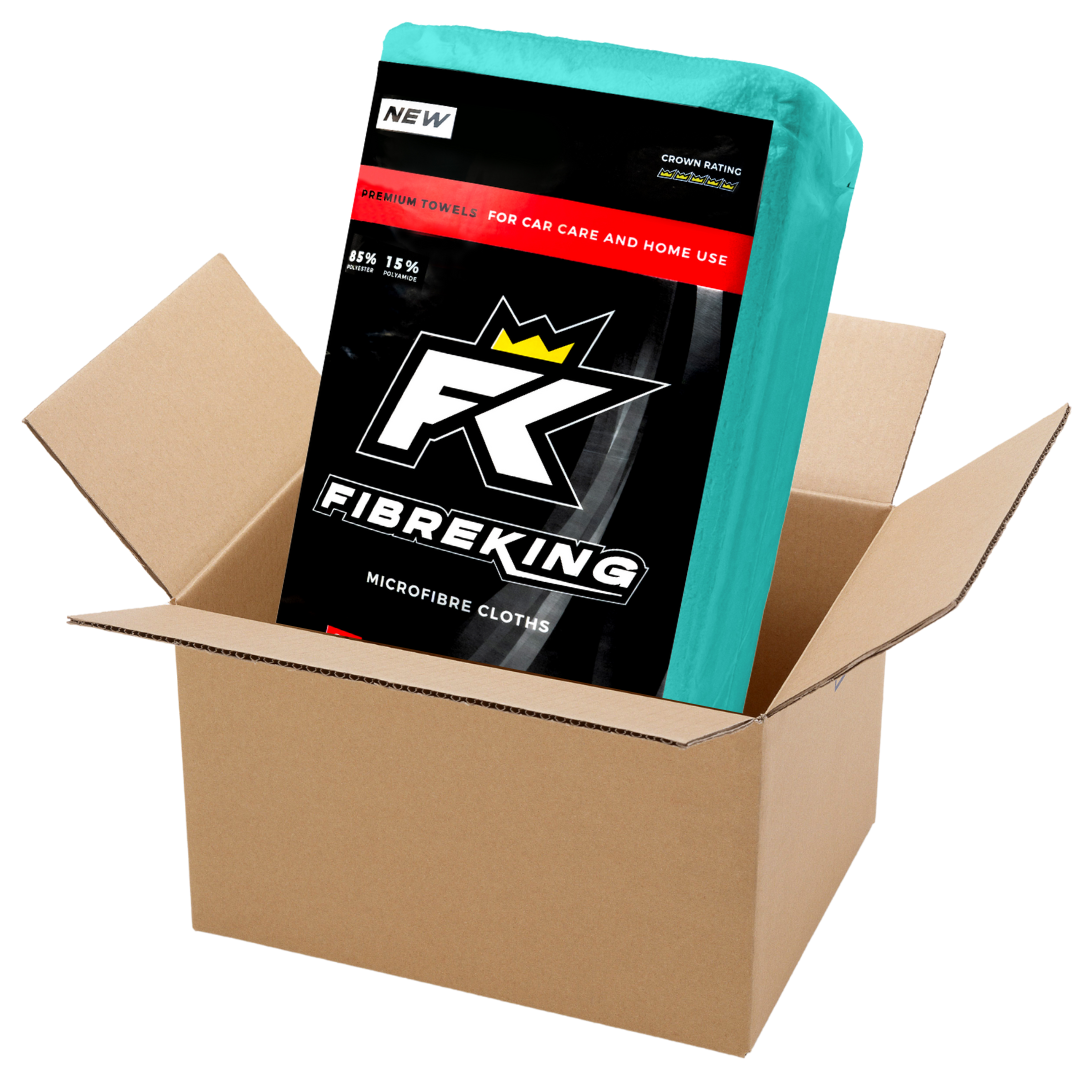 A box of FibreKing Silver Label 325GSM microfibre cloths (10 packs of 36), ideal for cleaning cars, comes in a teal bag within an open brown cardboard box and is machine washable and reusable.