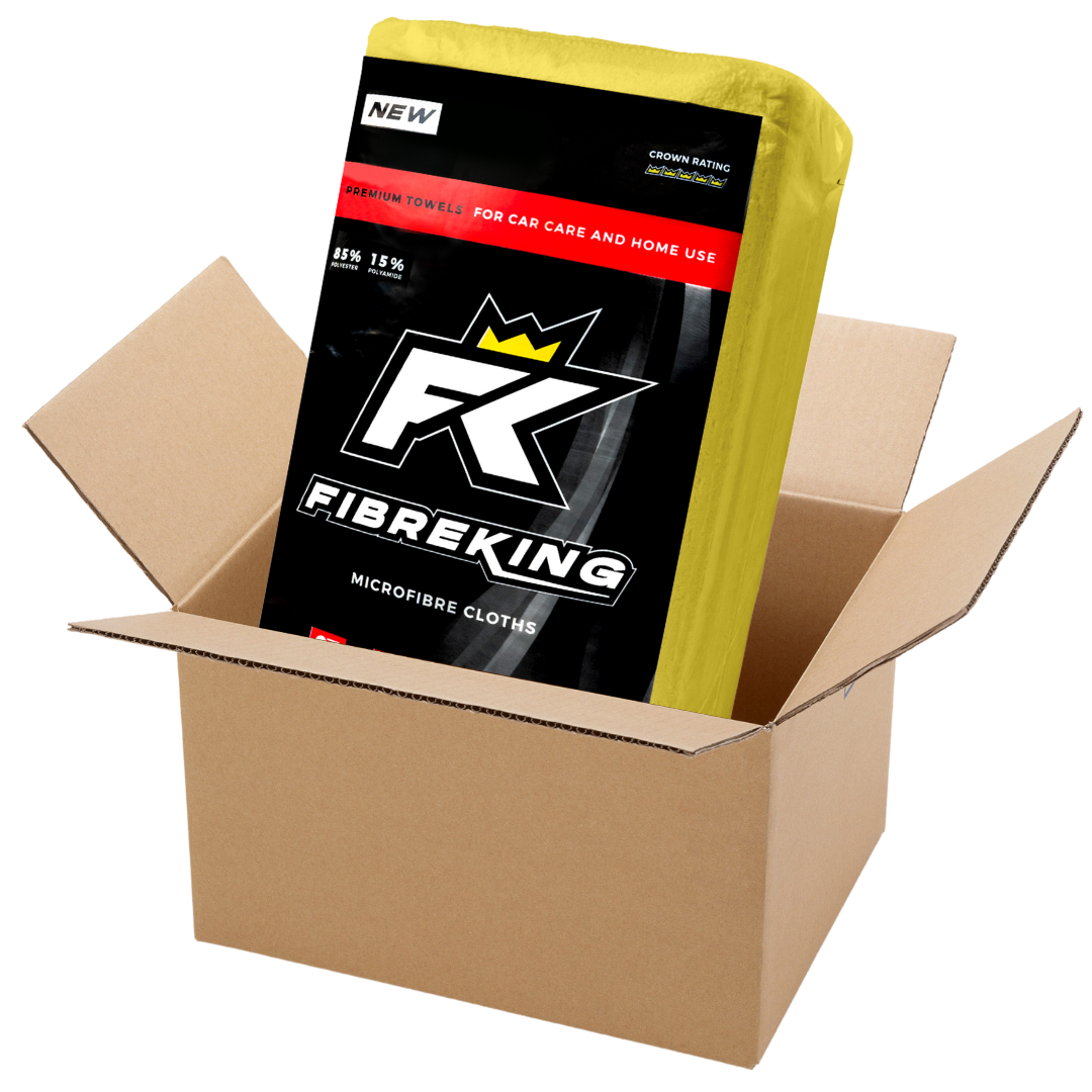 A box containing 10 packs of 36 FibreKing Silver Label 325GSM microfibre cloths, ideal for car cleaning and machine washable, sits in a yellow wrapper inside an open cardboard box.