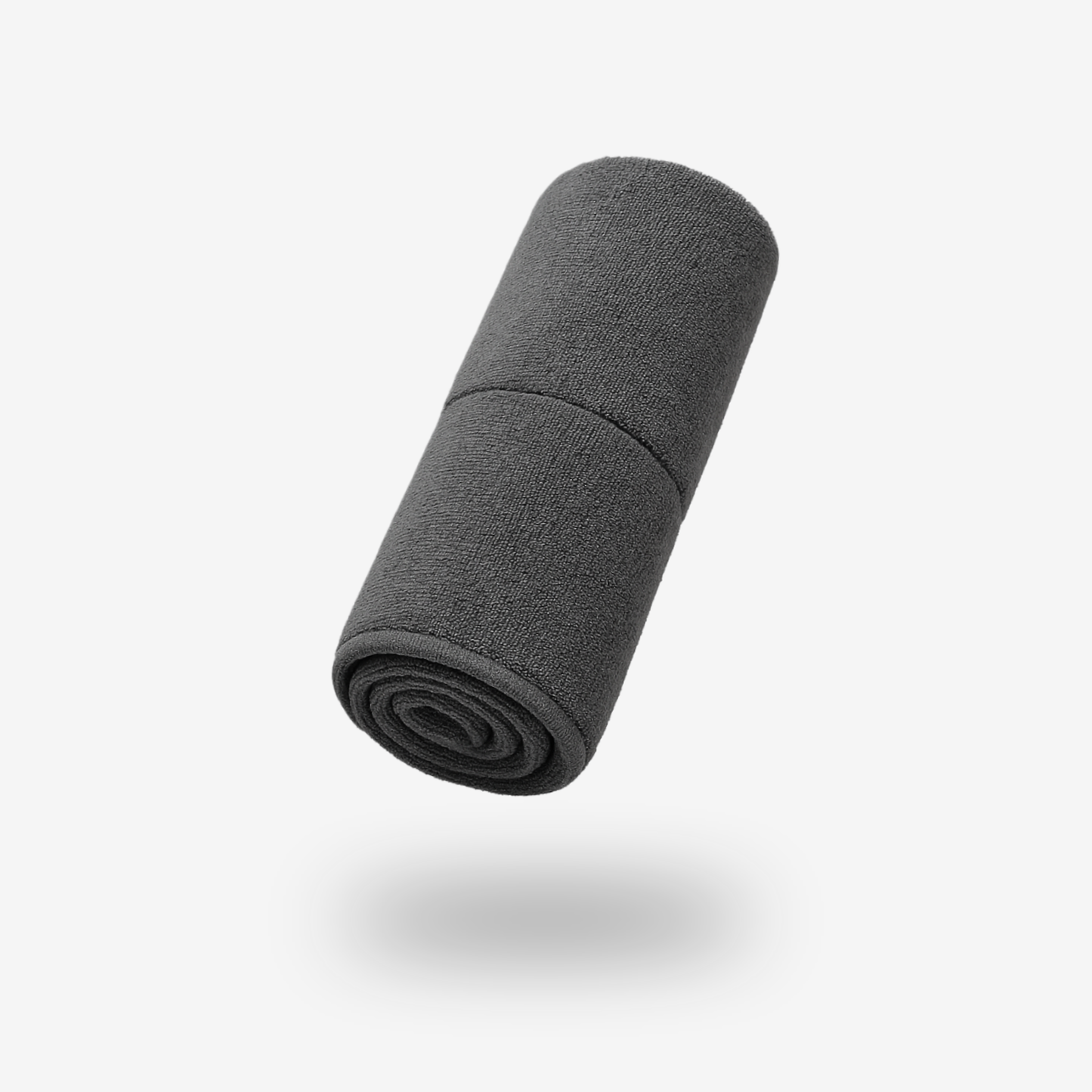The FibreKing Gold Label 900 GSM Korean Drying Towel, in dark gray microfiber, is neatly rolled and hovers above a white background with a soft shadow, highlighting its premium car care quality.