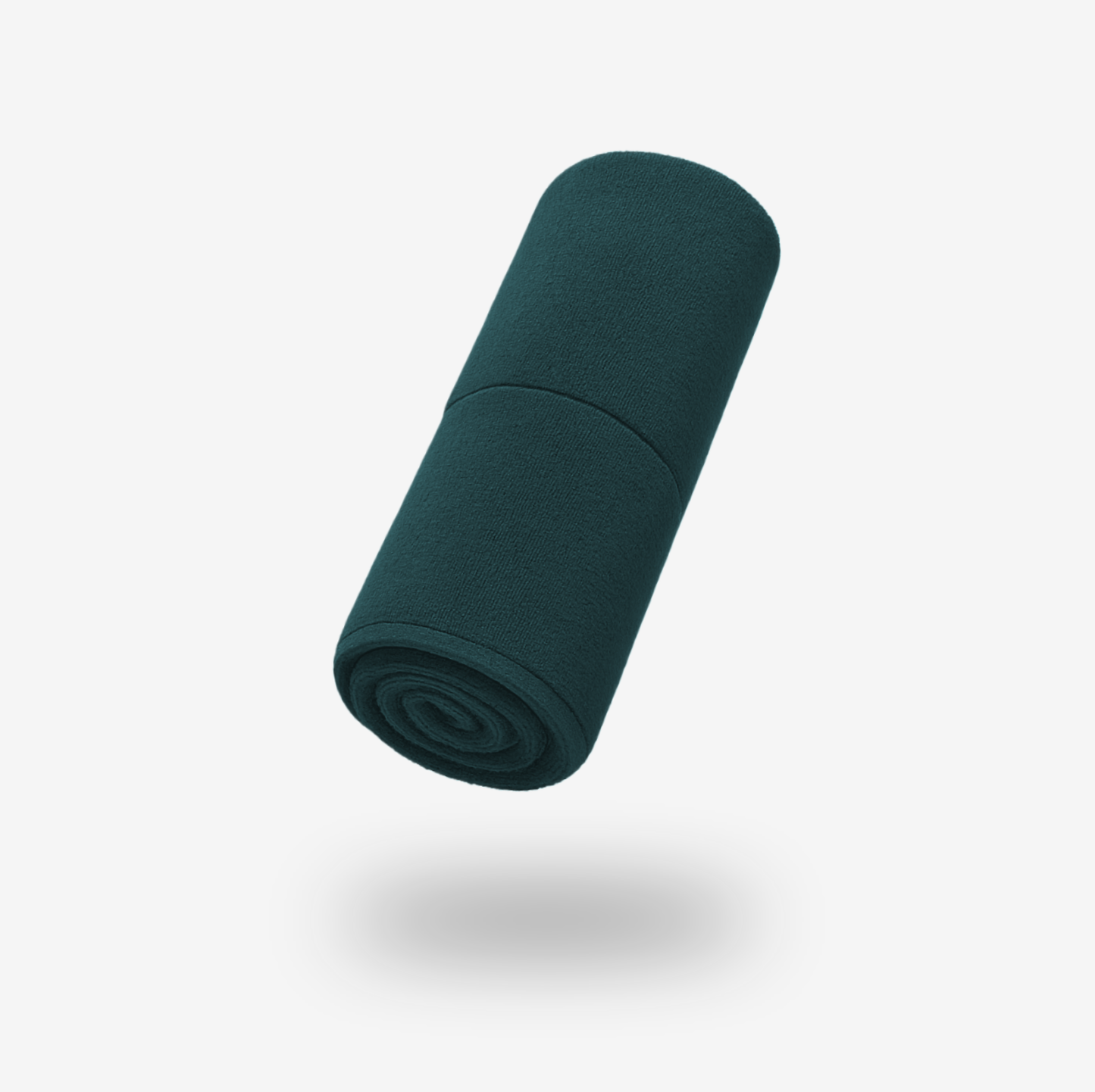 A dark green FibreKing Gold Label 900 GSM Korean Drying Towel, made from a premium microfiber blend, is rolled up and suspended above a white background with a soft shadow beneath.