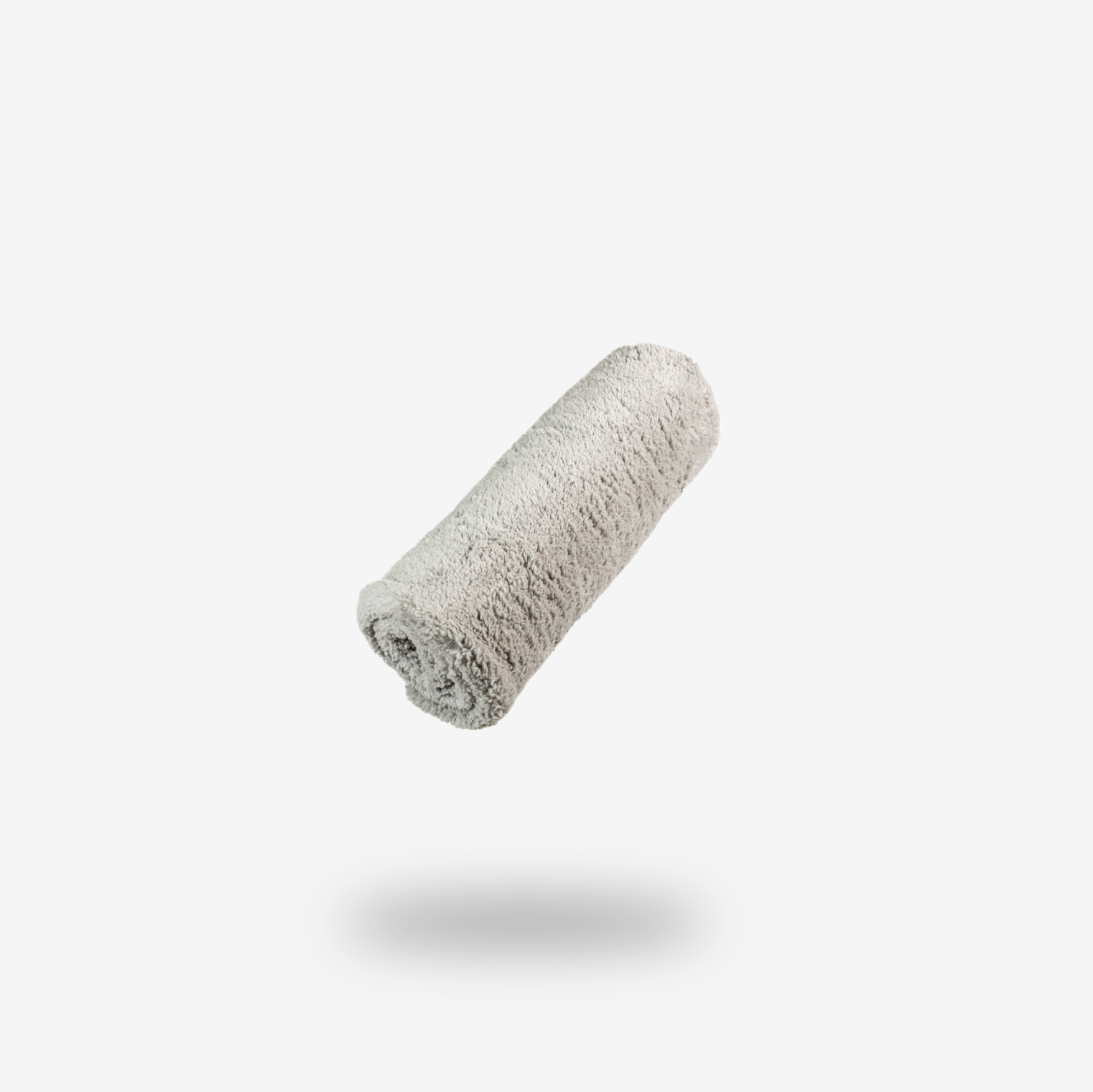 The FibreKing Ultimate detailer cloth, made from light gray coral fleece microfibre, is shown rolled up on a plain white background with a soft shadow underneath.