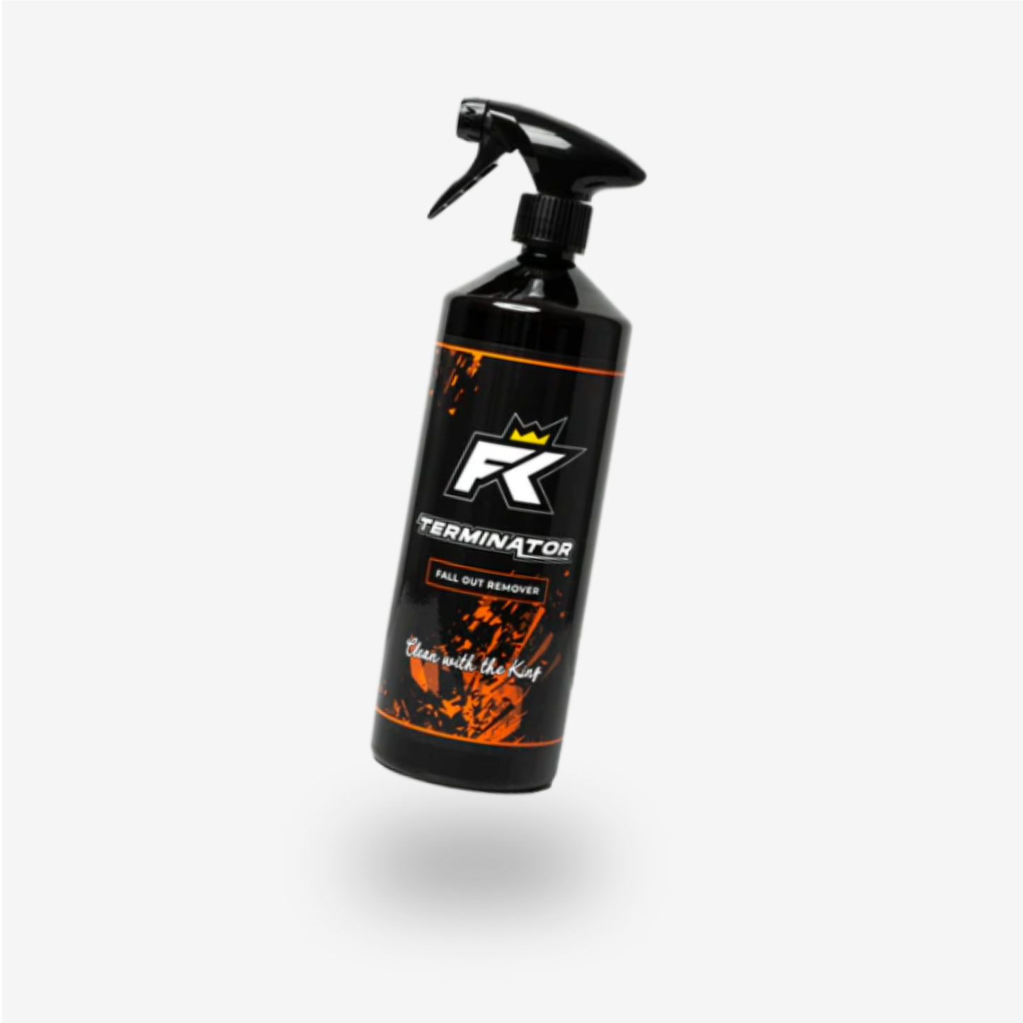 A black spray bottle labeled FibreKing Terminator - Fall Out Remover, featuring orange accents and designed to remove iron contaminants, floats against a plain white background.