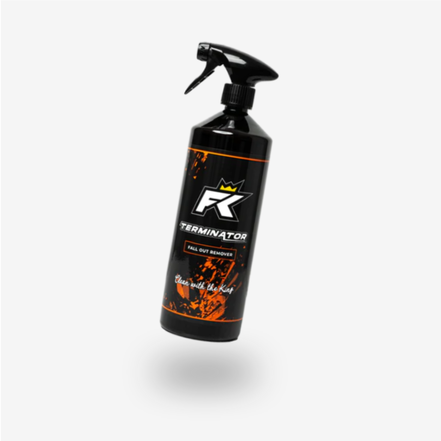 A black spray bottle labeled FibreKing Terminator - Fall Out Remover, featuring orange accents and designed to remove iron contaminants, floats against a plain white background.