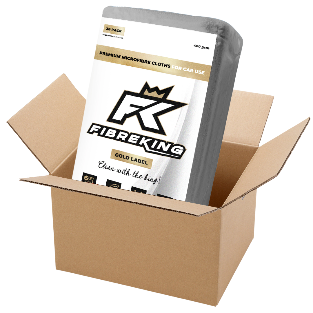 A cardboard box of FibreKing Gold label 400GSM microfibre cloths includes 6 packs of 36 premium, ultra-absorbent cloths for cars, offering superior cleaning power.