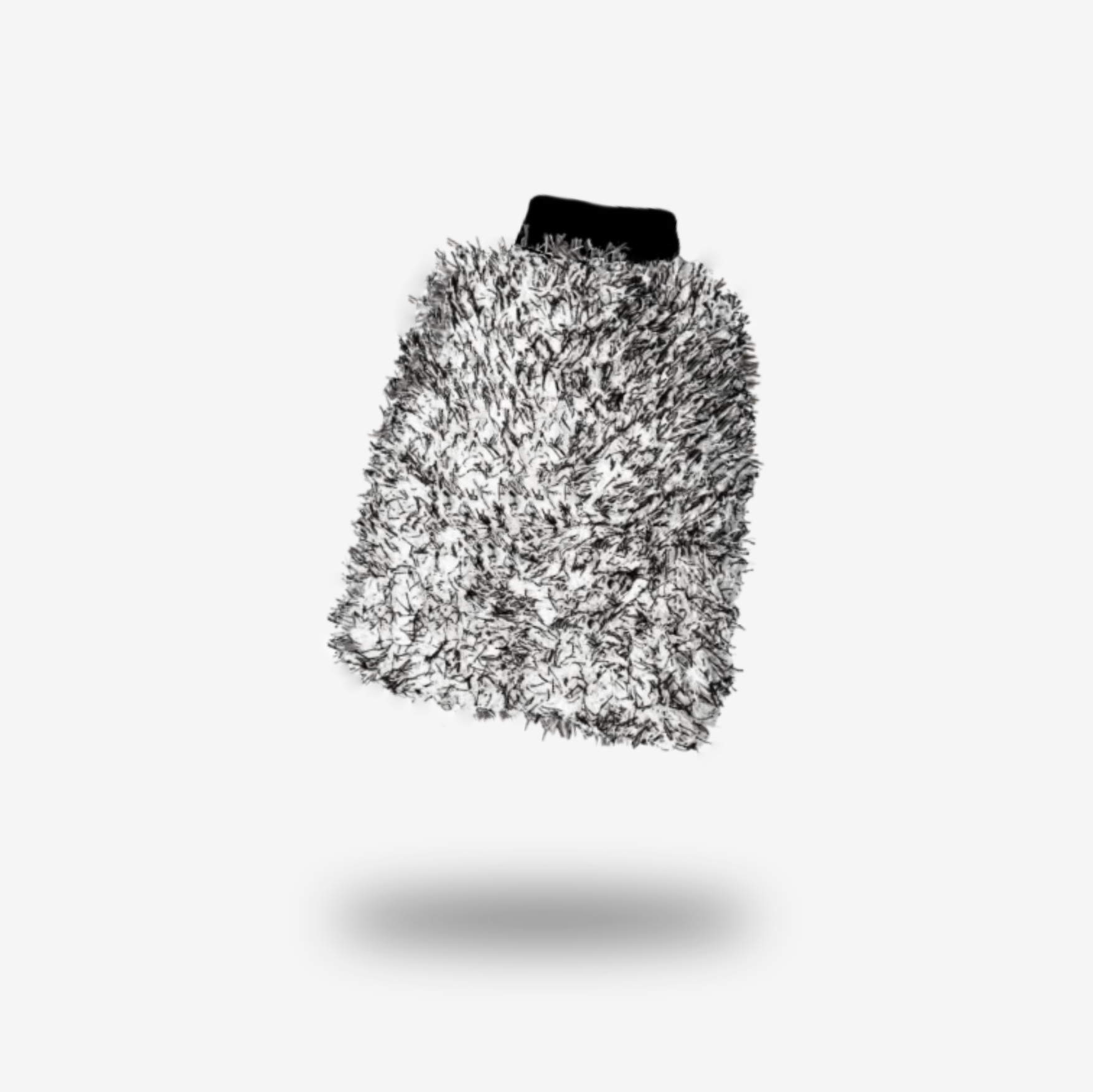 A FibreKing Silver Label Korean Microfibre Wash Mitt - Black, featuring fluffy gray and white premium fibres with a black cuff, is shown isolated on a plain white background with a shadow beneath.