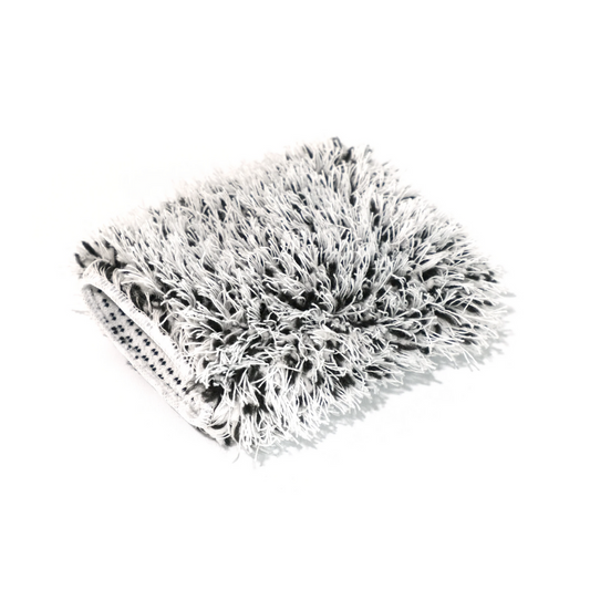 A folded FibreKing Gold Label Korean Wheel Mitt, made from premium gray and white Korean microfibre with long, soft fibers, rests on a white background.