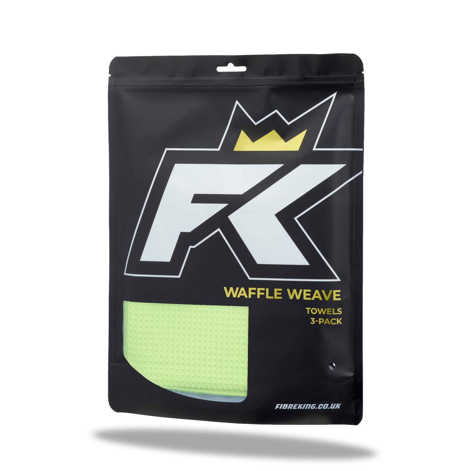 A black resealable pouch labeled FibreKing Waffle Weave Towels - 3 Pack, with a yellow microfiber detailing towel partially visible inside.