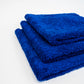 Three blue FibreKing Duplex Edgeless Cloths—3 pack—are neatly stacked on a white surface, highlighting their premium microfibre quality for gentle, precise cleaning.