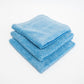 Three FibreKing Duplex edgeless cloths (3 pack) in blue dual pile microfiber are neatly folded and stacked against a plain white background.