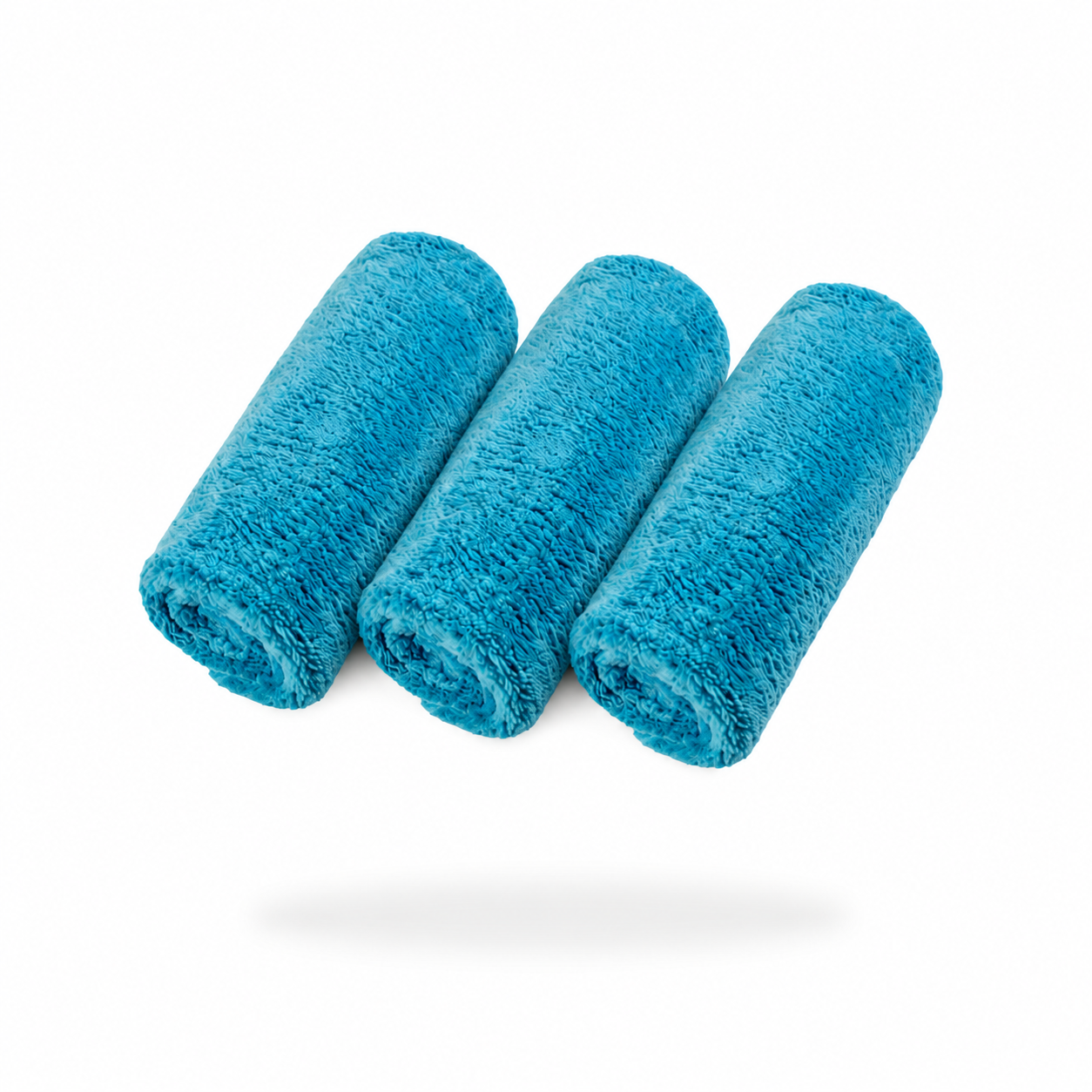 Three FibreKing Ultimate detailer cloths, sold as a 3 pack, are rolled and arranged side by side on a white background with a soft shadow underneath.