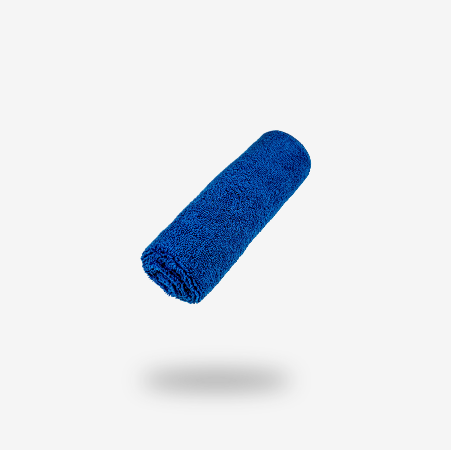 A rolled-up blue FibreKing Build Your Own Gold label Pack is suspended against a plain white background with a slight shadow below.