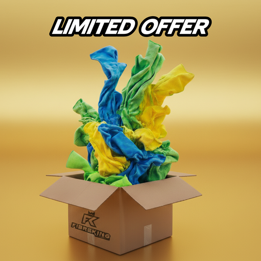 A cardboard box labeled FIREKING overflows with blue, green, and yellow FibreKing Gold Label Microfibre Bundle cloths; "LIMITED OFFER" appears above on a gold background.