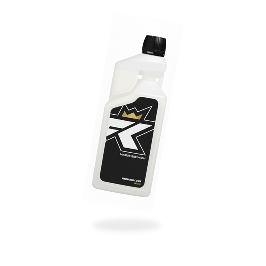 A plastic bottle from FibreKing’s Complete Car Cleaning Kit, designed for microfibre care, features a black label with white text and a black screw cap, displayed on a white background with a soft shadow.